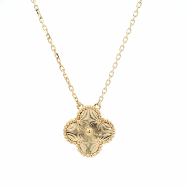 an Cleef and Arpels Gold Guilloche Necklace